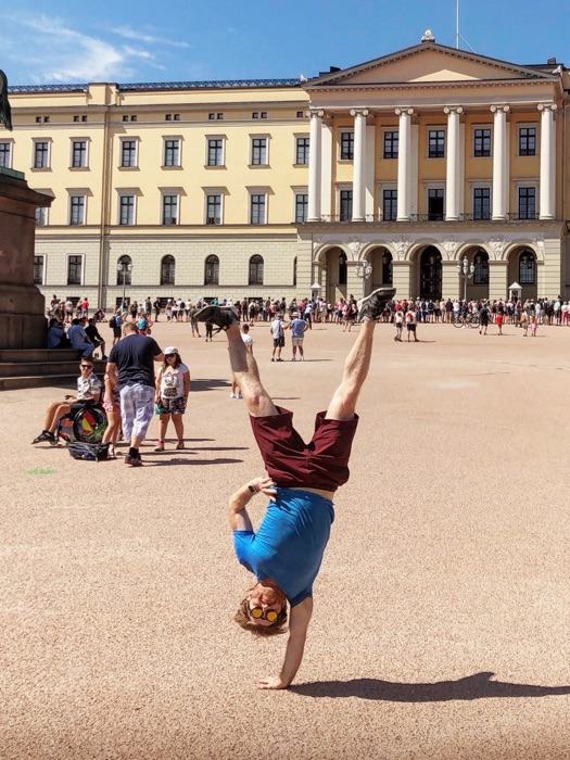 One-armed handstand outside the Royal Palace in Oslo